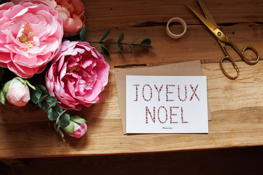 Carte postale Noël fleuri, illustration botanique festive sur papier - Flowrette